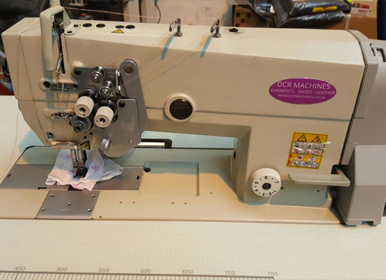 Photo of an DCR TNSB- Twin Needle Flat Bed Split Bar Sewing Machine Industrial Sewing Machines