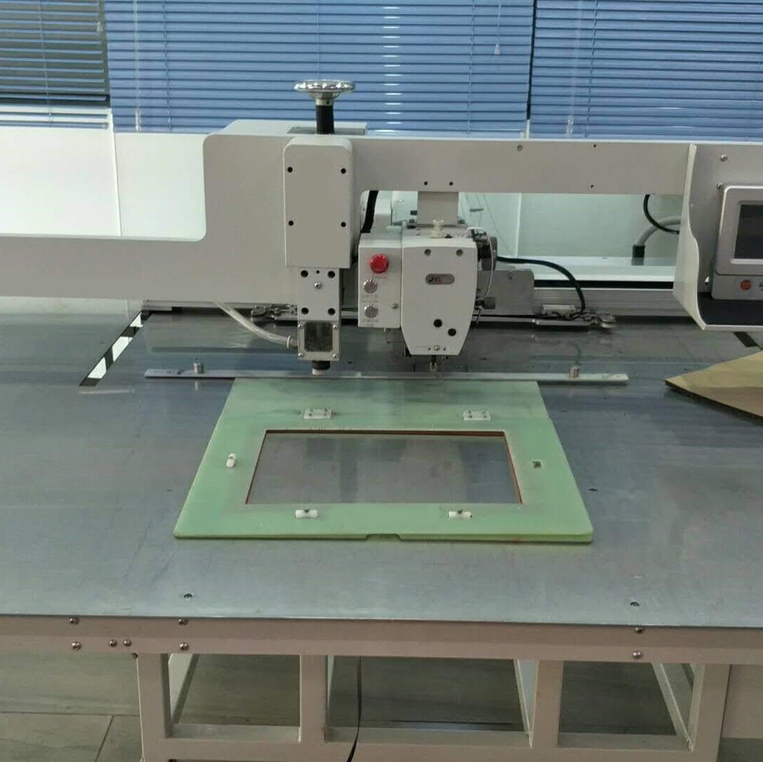 Photo of an DCR ASP68 Automatic Stitch & Punch sewing machine   Industrial Sewing Machines